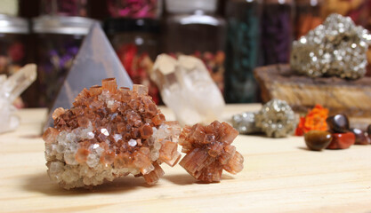 Aragonite Carbonate Crystals With Pyramid in Background