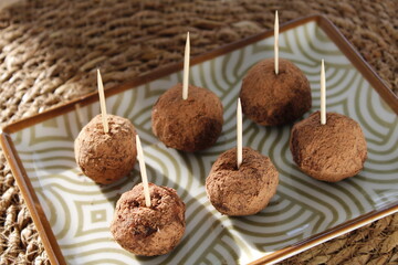 Healthy snack, Nut-palm and coconut energy balls, Sugar-free, gluten-free desserts, Selective focus.