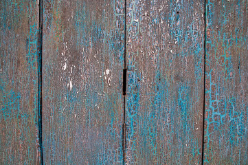 Closed up view of old dark cyan wooden closed door of a traditional house in Asia