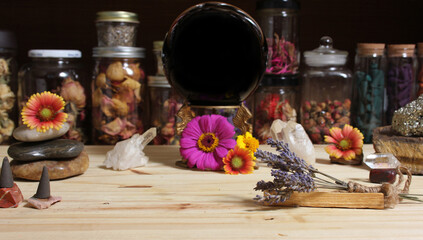 Meditation Altar With Rock Crystals and Flowers. Jars of Herbs in Background