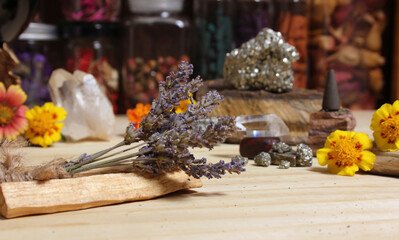 Dried Lavender on Palo Santo Sticks With Crystals and Flowers in Background
