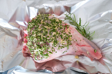 A leg joint of fresh English lamb ready for roasting with rosemary