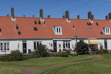 View of Zandvoort national monument: Gasthuishofje (Guest house courtyard) - first structure in Zandvoort's reconstruction plan. Zandvoort, North Holland, the Netherlands. - obrazy, fototapety, plakaty