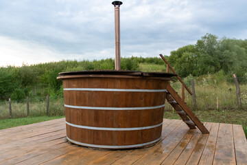 Traditional wooden hot tub.