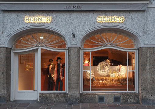 Luminous shop windows of the Hermes boutique in the center of Salzburg
