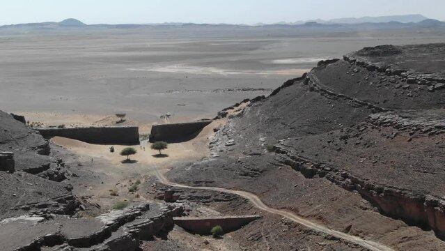 Aerial drone view of Gara Medouar unusual geological formation of Errachidia near Sijilmasa in Morocco, Africa