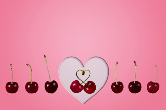 single couple love cherries cherry fruit concept image with row line of cherries & heart on a colorful colourful pink background