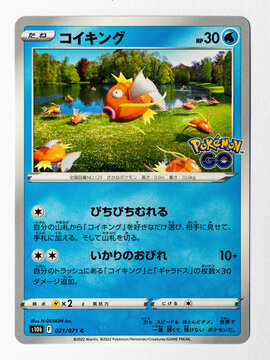Hamburg, Germany - 30062022: photo of the Japanese common trading card Magikarp from the Pokémon GO series.