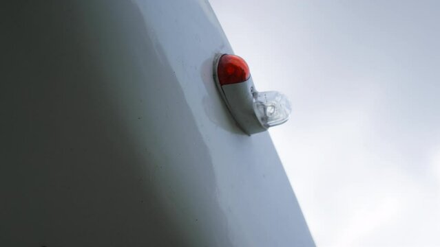 Closeup small plane part on wing white ultralight parked private plane