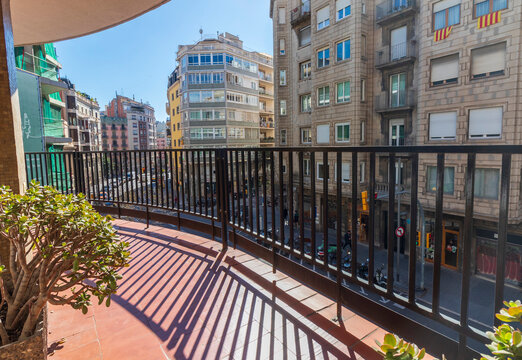 Large balcony in a block of buildings in a big city like Barcelona