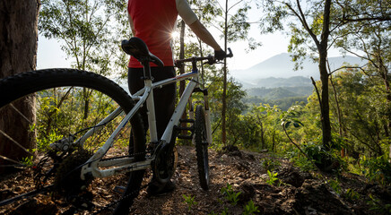 Fototapeta Mountain biking in spring forest obraz