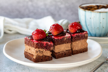 Strawberry tartlet. Small strawberry cake in a plate. On stone floor. close up