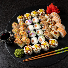 tasty sushi on the black background