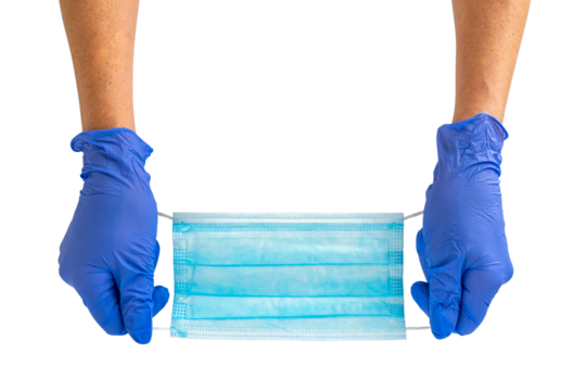 Hand holds a medical face mask against viruses and bacteria - Powered by Adobe