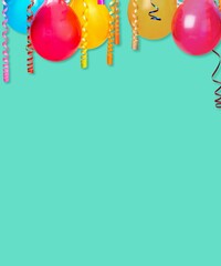 Birthday party decoration with balloons, steamers and confetti on a background