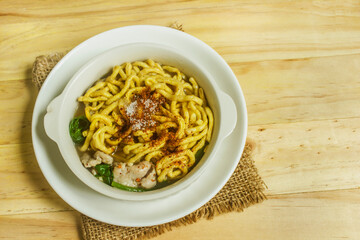 Crispy yellow noodles with pork and vegetables In Thai it is called 