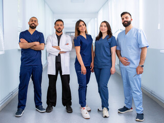 A group of students in the lobby of the medical university. A team of surgical interns in the...