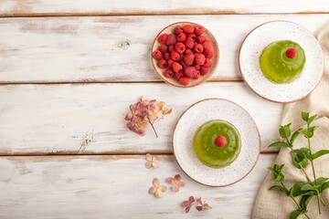 Mint and raspberry jelly on white wooden. top view, copy space.