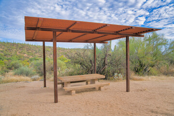 Campground with picnic table under a roof at Sabino Canyon State Park in Tucson, Arizona
