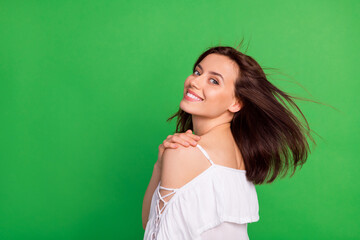 Fototapeta Profile photo of nice satisfied lady toothy smile hand touch shoulder isolated on green color background obraz