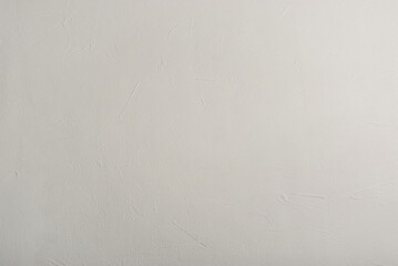 White background with various lines, bumps, texture and good definition throughout the photo. The background looks like a photograph of plaster.