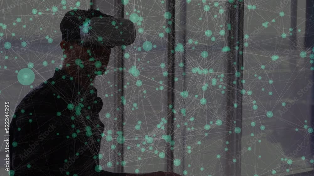 Poster animation of network of connections with icons over caucasian businessman using vr headset