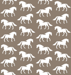 Vector seamless pattern of hand drawn pre spanish horse silhouette isolated on brown background