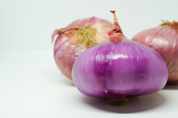 Fresh Raw Bulb Onions in whole isolated on a white background.