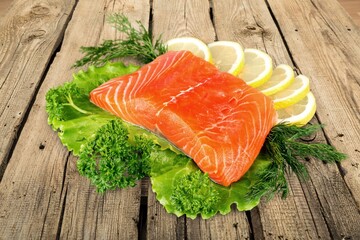 Tasty fish fillet on a wooden desk
