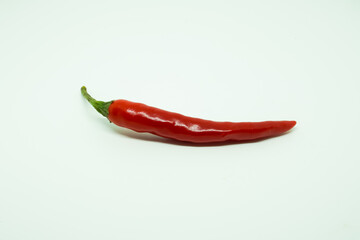 Red hot chili peppers on white background.