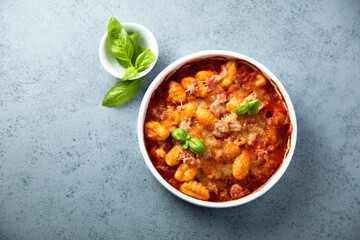 Baked potato gnocchi with tomato sauce and basil