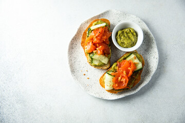 Toast with cucumber and smoked salmon