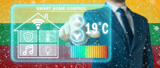 Frozen citizen of Lithuania adjusting heating temperature on a virtual screen of smart home controller, winter blizzard background. Concept of forced thrift because increased price for heating home