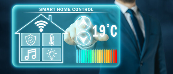 Man adjusting heating temperature on a virtual screen of smart home controller, dark background