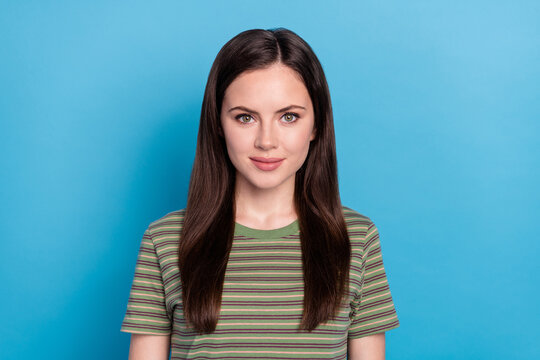 Photo of nice millennial brunette lady wear green t-shirt isolated on blue color background