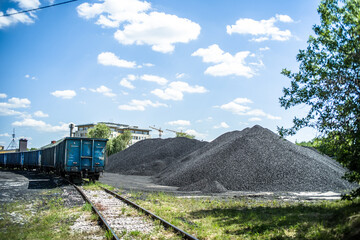 empty railway wagon for transportation of coal and coal halide in sunny day - obrazy, fototapety, plakaty