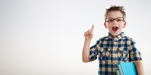 Child smiling happy student keeps pointing finger, Portrait little children boy preschool, Back to school
