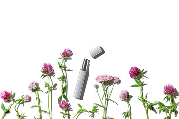 Perfume product, grey spray metal bottle and fragrant wildflowers around, isolated on white...