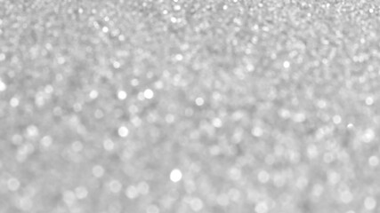 White and grey bokeh glitter background.  New Year, Christmas and all celebrations backgrounds concepts. 