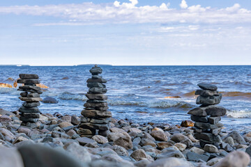 Balanced stone pyramide on shore of Lake Onega in Karelia.