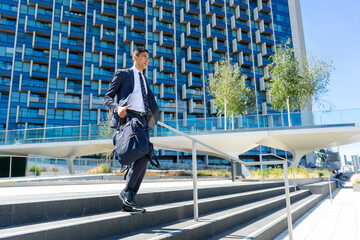 Businessman walking in business district