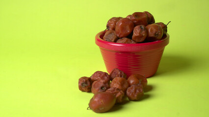 Indian jujube or ber or berry grown in the wild or jungle. Closeup of India fruit on beautiful background.