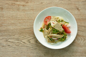 Vietnamese pork sausage with vegetable spicy and sour salad on plate   