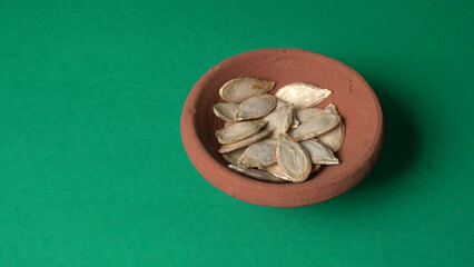  white sesame seeds, sesame seeds in a wooden spoon on an old rustic background close-up