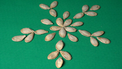  white sesame seeds, sesame seeds in a wooden spoon on an old rustic background close-up