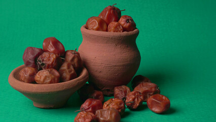 Indian jujube or ber or berry grown in the wild or jungle. Closeup of India fruit on beautiful background.