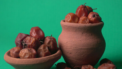Indian jujube or ber or berry grown in the wild or jungle. Closeup of India fruit on beautiful...