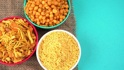 Indian Snacks, Traditional Indian deep fried salty dish called chivda or mixture or farsan made of...