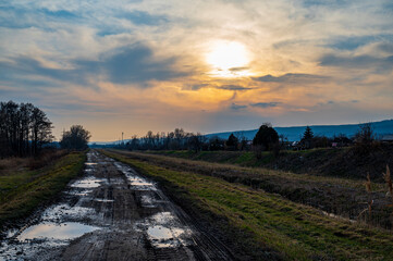 Sunset over dirt road