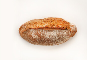 Fototapeta na wymiar Artisan bread on white background. One loaves on wheat bread on white background.